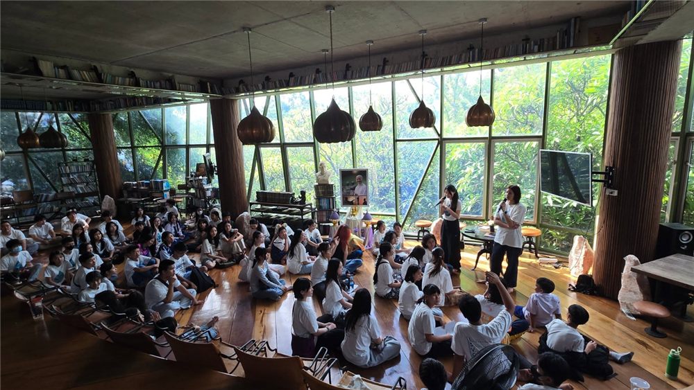 ISV Club members seated for a workshop session in a glass-walled room at Sathira-Dhammasathan